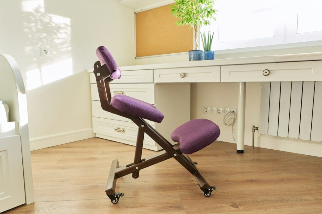 Orthopedic ergonomic kneeling chair in the interior of children's room, home office