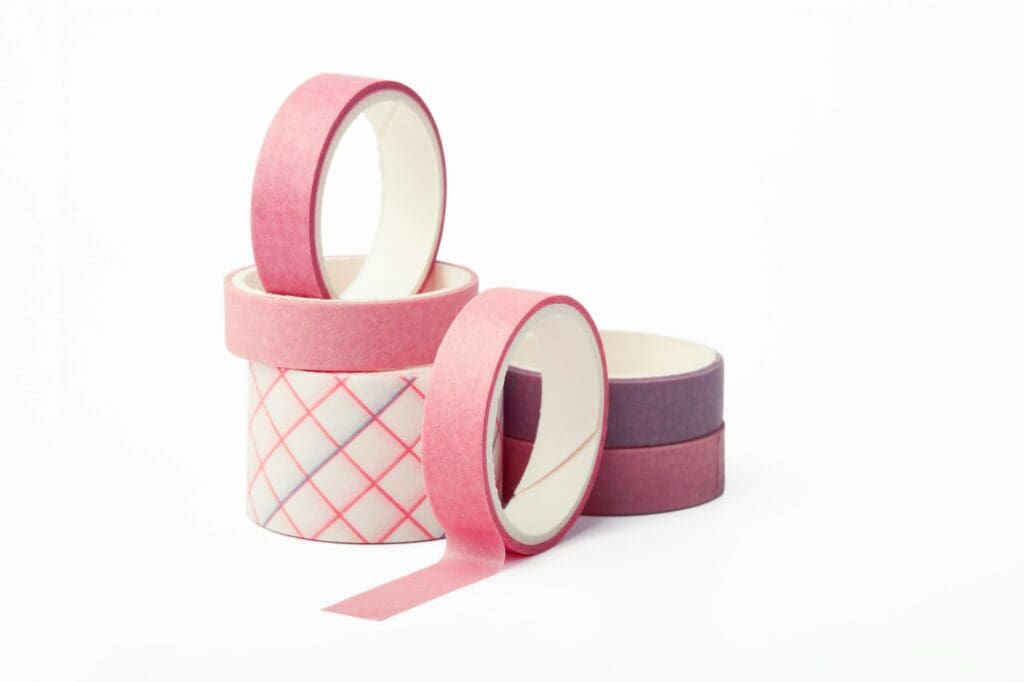 Pink and purple rolls of washi tape 