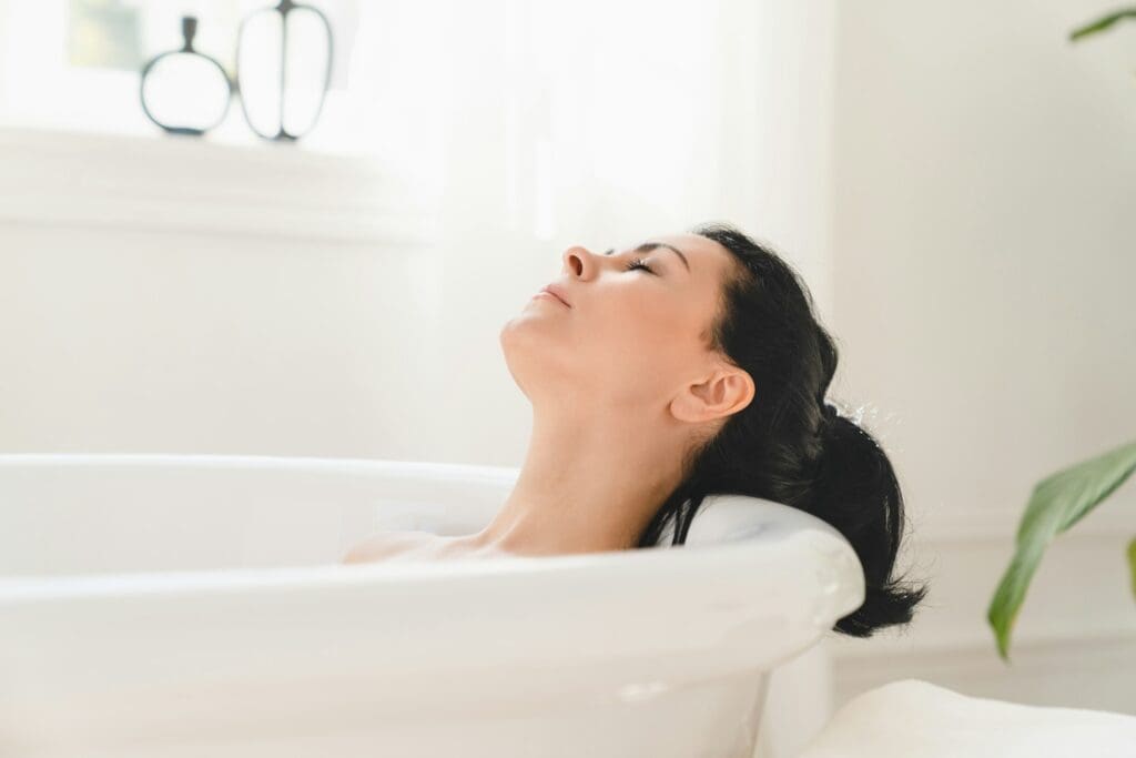 woman relaxing in bath warm