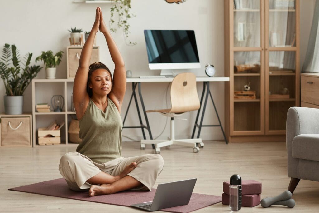 Woman doing yoga at home