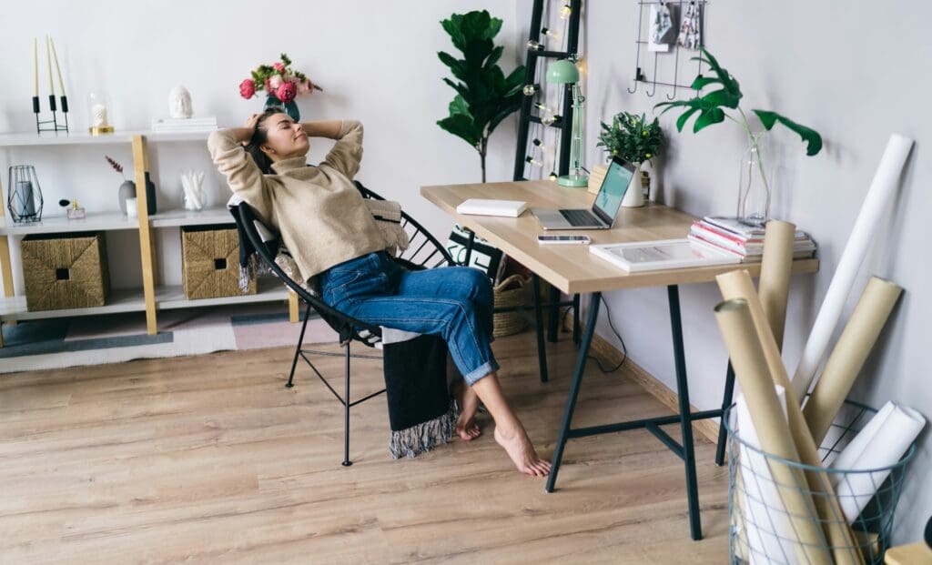 Woman having break from work at home